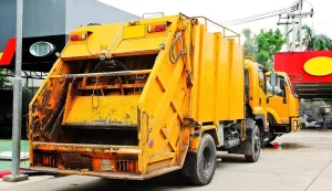 A fully-loaded garbage truck weighs about 25 tons